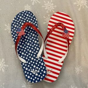 Red, white, and blue Forth of July Justice flip flops.